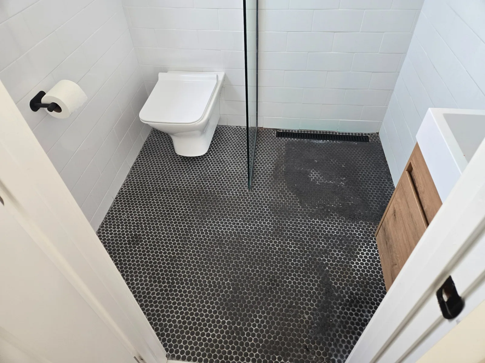 Before: Bathroom Mosaic to Herringbone Tile
